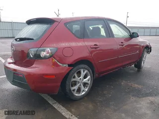 2009 Mazda Mazda3 s Touring with VIN JM1BK343491204607, listed as a IAAI auction lot 41488515 with 117,634 mi miles. Bid and sale history available at carsss.com. Image 4.