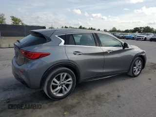 2018 Infiniti QX30 Luxury z VIN SJKCH5CP2JA057398, wystawiony jako Copart lot #54543755 z przebiegiem 99 058 mil mil oraz Tytuł czysty. Historia ofert i sprzedaży dostępna na DreamBid. Obrazek 3.
