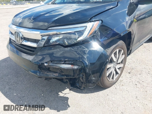 2020 Honda Pilot EX-L with VIN 5FNYF5H59LB014225, listed as a IAAI auction lot 41689776 with 90,994 mi miles. Bid and sale history available at carsss.com. Image 6.