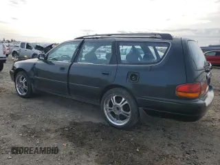 1995 Toyota Camry LE z VIN 4T1GK12W4SU079938, wystawiony jako Copart lot #77065084 z przebiegiem 222 731 mil mil oraz Szkoda całkowita • Salvage title. Historia ofert i sprzedaży dostępna na DreamBid. Obrazek 2.
