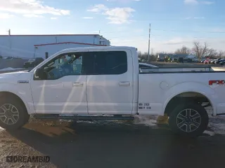 2015 Ford F-150 XLT w/HD Payload Pkg with VIN 1FTFW1EF6FFC66723, listed as a IAAI auction lot 41303476 with 203,999 mi miles. Bid and sale history available at carsss.com. Image 14.