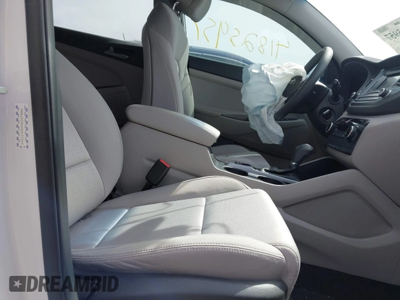 2017 Hyundai Tucson SE with VIN KM8J3CA44HU437644, listed as a IAAI auction lot 41825957 with 59,402 mi miles. Bid and sale history available at carsss.com. Image 5.