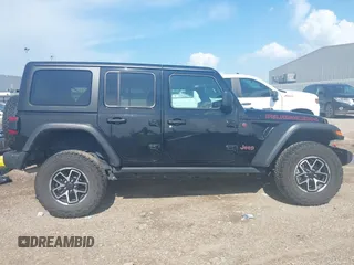 2024 Jeep Wrangler Rubicon with VIN 1C4PJXFG0RW271322, listed as a IAAI auction lot 42736647 with 32,319 mi miles and . Bid and sale history available at DreamBid. Image 13.