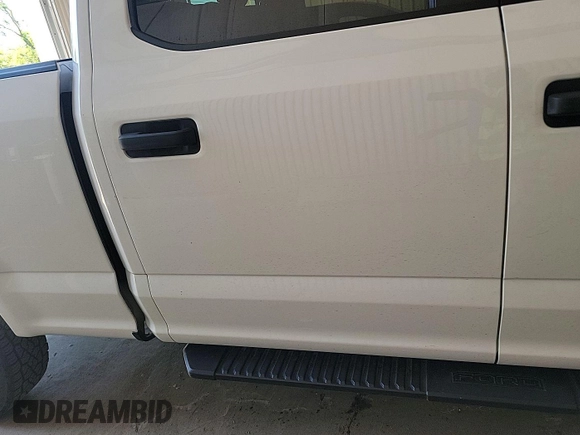 2020 Ford F-150 XL with VIN 1FTFW1E5XLKF11517, listed as a IAAI auction lot 42303677 with 128,253 mi miles and . Bid and sale history available at DreamBid. Image 1.
