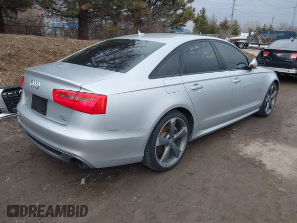2015 Audi A6 3.0T Prestige with VIN WAUHGAFC5FN026947, listed as a IAAI auction lot 41718442 with 110,410 mi miles. Bid and sale history available at carsss.com. Image 4.
