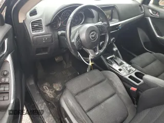 2016 Mazda CX-5 Touring with VIN JM3KE2CY9G0661308, listed as a Copart auction lot 51853485 with 131,595 mi miles and Salvage Title. Bid and sale history available at carsss.com. Image 8.