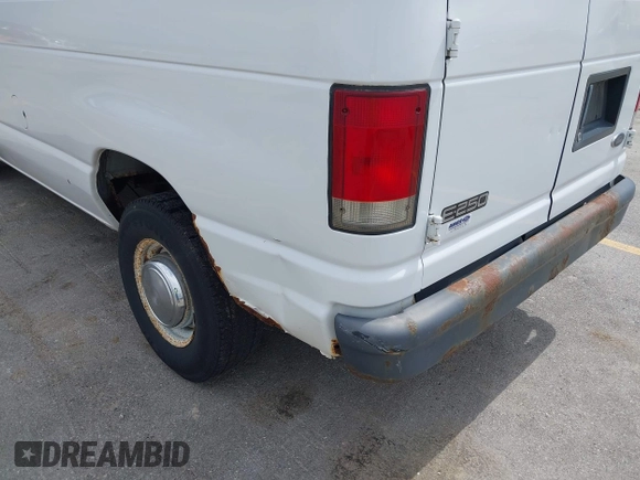 2004 Ford Econoline Cargo with VIN 1FTNE24W84HB38152, listed as a IAAI auction lot 42090193 with 102,357 mi miles. Bid and sale history available at carsss.com. Image 13.