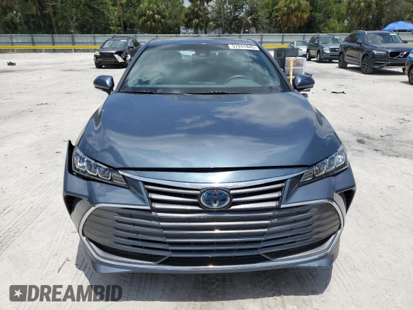 2021 Toyota Avalon Hybrid XLE z VIN 4T1AA1AB8MU007487, wystawiony jako Copart lot #57241445 z przebiegiem 63 154 mil mil oraz Nie do naprawy • Non repairable. Historia ofert i sprzedaży dostępna na DreamBid. Obrazek 5.