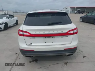 2016 Lincoln MKX Reserve with VIN 2LMPJ6LP8GBL33580, listed as a IAAI auction lot 41749632 with 100,579 mi miles. Bid and sale history available at carsss.com. Image 16.