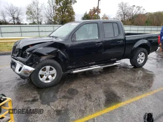 2009 Nissan Frontier LE with VIN 1N6AD09U69C402936, listed as a Copart auction lot 78945954 with 223,318 mi miles and Salvage title. Bid and sale history available at DreamBid. Image 1.