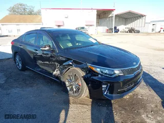 2018 Kia Optima SX with VIN 5XXGV4L22JG242602, listed as a IAAI auction lot 41667643 with 61,884 mi miles. Bid and sale history available at carsss.com. Image 1.