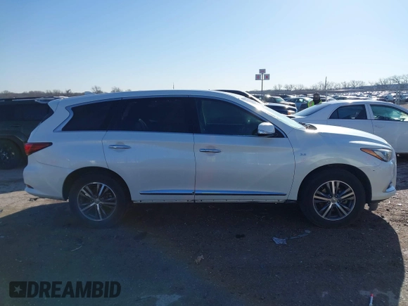 2016 Infiniti QX60 with VIN 5N1AL0MN7GC507726, listed as a IAAI auction lot 41754036 with 167,213 mi miles. Bid and sale history available at carsss.com. Image 13.