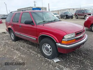 2000 Chevrolet Blazer LT z VIN 1GNDT13W4Y2210137, wystawiony jako IAAI lot #41808783 z przebiegiem Nie podano mil oraz . Historia ofert i sprzedaży dostępna na DreamBid. Obrazek 1.
