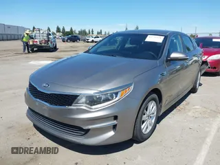 2016 Kia Optima LX with VIN 5XXGT4L36GG098804, listed as a IAAI auction lot 42772231 with 206,471 mi miles and . Bid and sale history available at DreamBid. Image 2.