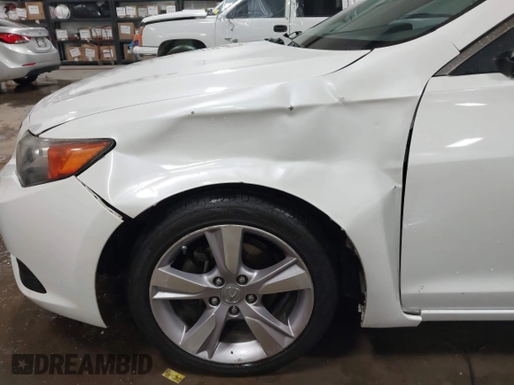 2014 Acura ILX z VIN 19VDE1F35EE006166, wystawiony jako IAAI lot #41320730 z przebiegiem 203 151 mil mil oraz . Historia ofert i sprzedaży dostępna na DreamBid. Obrazek 6.
