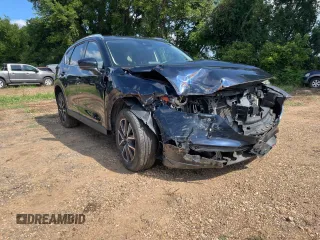 2018 Mazda CX-5 Grand Touring z VIN JM3KFBDMXJ1391984, wystawiony jako Copart lot #65138665 z przebiegiem 97 244 mil mil oraz Czysty tytuł • Clean title. Historia ofert i sprzedaży dostępna na DreamBid. Obrazek 1.