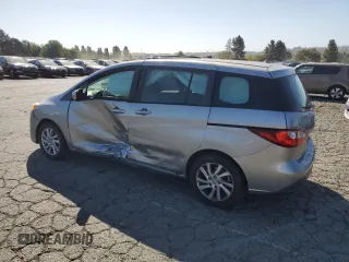 2012 Mazda 5 Sport with VIN JM1CW2BL4C0107068, listed as a Copart auction lot 62880615 with 142,610 mi miles and Salvage title. Bid and sale history available at DreamBid. Image 2.