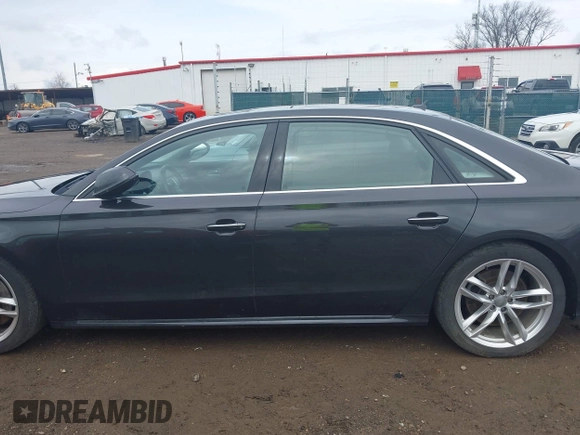 2016 Audi A8 L 4.0T Sport with VIN WAU43AFD3GN020763, listed as a IAAI auction lot 41951858 with 104,563 mi miles. Bid and sale history available at carsss.com. Image 15.