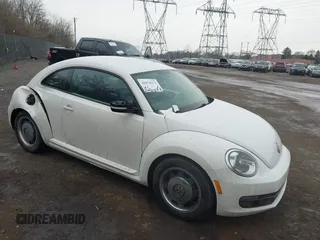 2012 Volkswagen Beetle 2.5L PZEV with VIN 3VWHP7AT9CM622739, listed as a IAAI auction lot 41674272 with 127,932 mi miles. Bid and sale history available at carsss.com. Image 12.