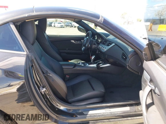 2011 BMW Z4 sDrive35i with VIN WBALM7C58BE383710, listed as a IAAI auction lot 41953452 with 102,510 mi miles. Bid and sale history available at carsss.com. Image 5.