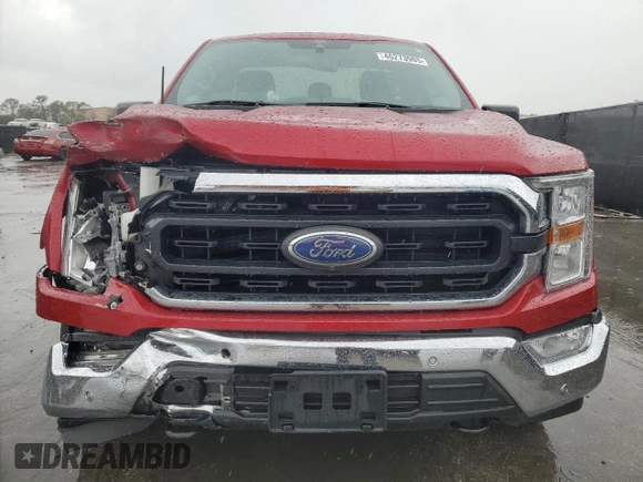 2021 Ford F-150 XL with VIN 1FTMF1E56MKE11052, listed as a Copart auction lot 46273985 with 31,100 mi miles and Salvage title. Bid and sale history available at DreamBid. Image 5.