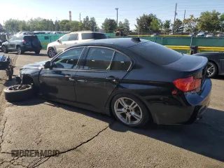 2015 BMW 3 Series 328i xDrive with VIN WBA3B3C59FJ985091, listed as a Copart auction lot 57658705 with 106,521 mi miles and Salvage title. Bid and sale history available at DreamBid. Image 2.
