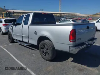 1999 Ford F-150 XL with VIN 1FTRX17L3XKB76368, listed as a IAAI auction lot 41959746 with Not Provided miles. Bid and sale history available at carsss.com. Image 3.