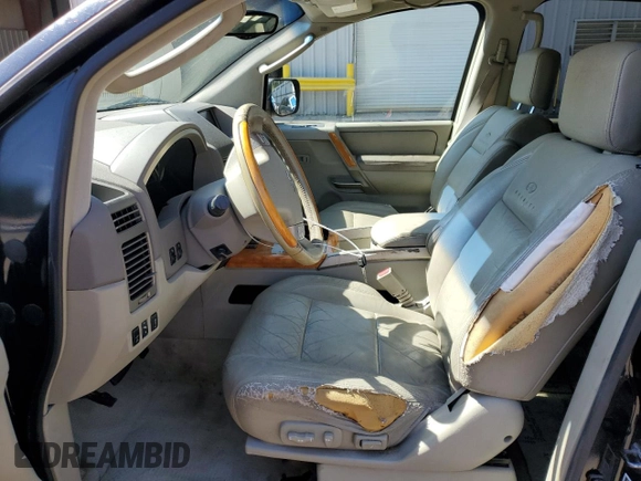 2004 Infiniti QX56 with VIN 5N3AA08C14N807476, listed as a Copart auction lot 75938334 with 200,675 mi miles and Salvage Title. Bid and sale history available at carsss.com. Image 7.