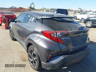 2019 Toyota C-HR XLE with VIN JTNKHMBX1K1062180, listed as a IAAI auction lot 41769979 with 75,159 mi miles. Bid and sale history available at carsss.com. Image 3.