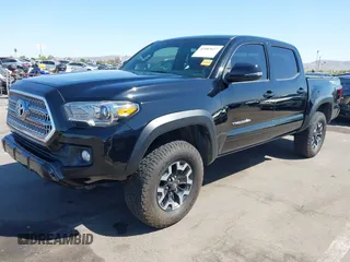 2016 Toyota Tacoma SR with VIN 3TMCZ5AN3GM019210, listed as a IAAI auction lot 42003617 with 171,581 mi miles. Bid and sale history available at carsss.com. Image 17.