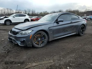 2015 BMW M4 z VIN WBS3R9C57FK329427, wystawiony jako Copart lot #53252995 z przebiegiem 94 039 mil mil oraz Szkody całkowita. Historia ofert i sprzedaży dostępna na DreamBid. Obrazek 1.
