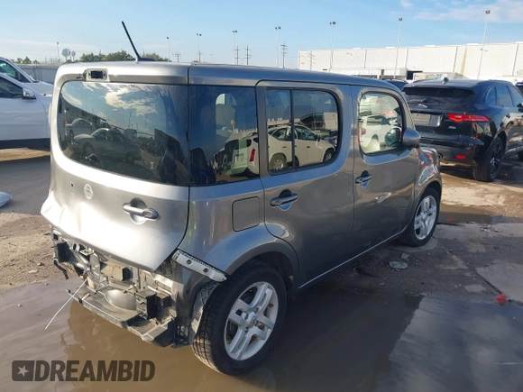 2013 Nissan Cube SL z VIN JN8AZ2KR8DT301092, wystawiony jako IAAI lot #41328574 z przebiegiem Nie podano mil oraz . Historia ofert i sprzedaży dostępna na DreamBid. Obrazek 4.