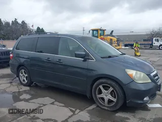 2005 Honda Odyssey TOURING with VIN 5FNRL38895B061480, listed as a IAAI auction lot 41807150 with 190,261 mi miles. Bid and sale history available at carsss.com. Image 1.