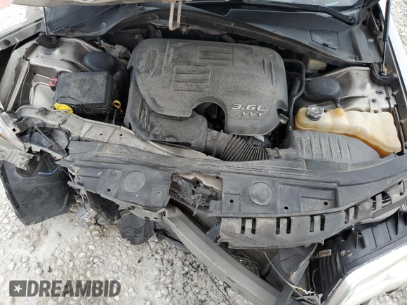 2014 Chrysler 300 z VIN 2C3CCAAG0EH157167, wystawiony jako Copart lot #54758765 z przebiegiem 107 138 mil mil oraz Szkoda całkowita • Salvage title. Historia ofert i sprzedaży dostępna na DreamBid. Obrazek 11.