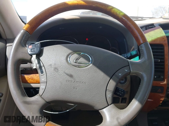 2007 Lexus GX with VIN JTJBT20X570145387, listed as a IAAI auction lot 42016545 with 153,907 mi miles and . Bid and sale history available at carsss.com. Image 11.