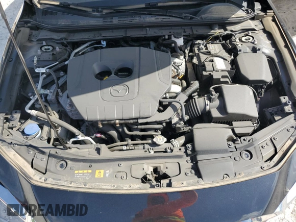 2024 Mazda 3 S Preferred с VIN 3MZBPACM2RM404675, выставлен на аукционе Copart как лот 63808045 с пробегом 2 145 миль миль и Списание • Salvage title. История ставок и продаж доступна на DreamBid. Изображение 11.