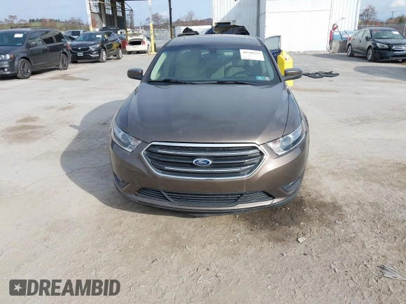 2015 Ford Taurus SEL with VIN 1FAHP2H87FG199865, listed as a IAAI auction lot 40760225 with 77,782 mi miles. Bid and sale history available at carsss.com. Image 12.