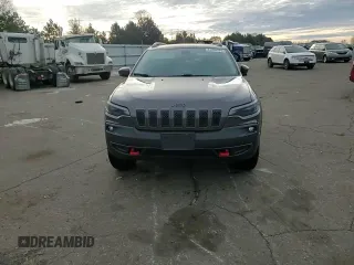2019 Jeep Cherokee Trailhawk Elite with VIN 1C4PJMBNXKD182846, listed as a Copart auction lot 84090984 with 79,212 mi miles and Salvage title. Bid and sale history available at DreamBid. Image 11.