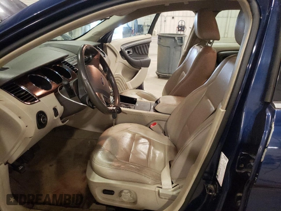 2012 Ford Taurus SEL with VIN 1FAHP2EW2CG143718, listed as a Copart auction lot 55443865 with 212,996 mi miles and Clean Title. Bid and sale history available at DreamBid. Image 7.