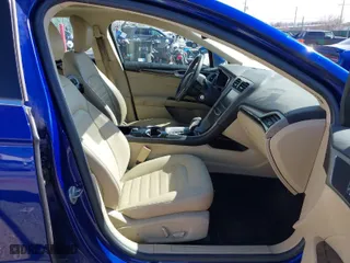 2014 Ford Fusion SE Hybrid with VIN 3FA6P0LU3ER219620, listed as a IAAI auction lot 41560424 with 153,681 mi miles. Bid and sale history available at carsss.com. Image 5.
