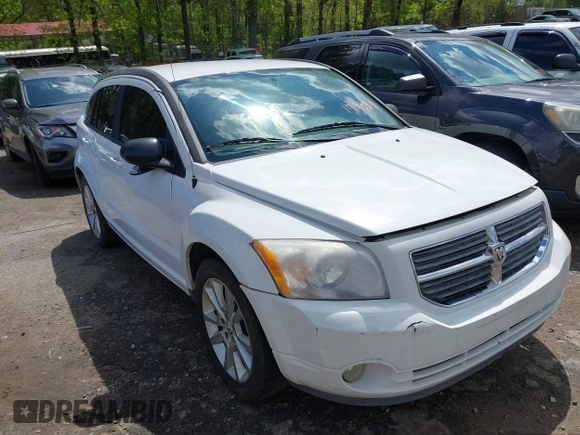 2011 Dodge Caliber Heat with VIN 1B3CB5HA9BD179055, listed as a IAAI auction lot 42008150 with 245,700 mi miles and . Bid and sale history available at DreamBid. Image 1.