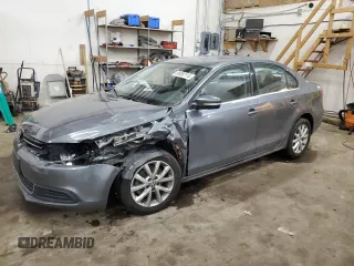 2013 Volkswagen Jetta SE with VIN 3VWDX7AJ2DM309725, listed as a Copart auction lot 86052114 with 70,828 mi miles and Salvage title. Bid and sale history available at DreamBid. Image 1.