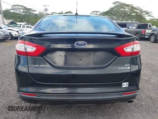 2013 Ford Fusion SE Hybrid z VIN 3FA6P0LUXDR181849, wystawiony jako IAAI lot #41949276 z przebiegiem 112 688 mil mil oraz . Historia ofert i sprzedaży dostępna na DreamBid. Obrazek 16.