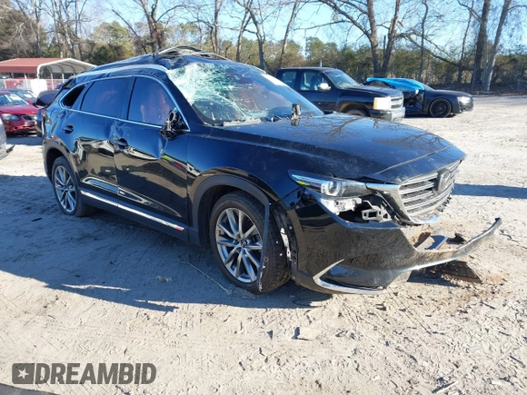 2018 Mazda CX-9 Grand Touring z VIN JM3TCADY5J0204845, wystawiony jako IAAI lot #41292695 z przebiegiem 98 751 mil mil oraz . Historia ofert i sprzedaży dostępna na DreamBid. Obrazek 1.