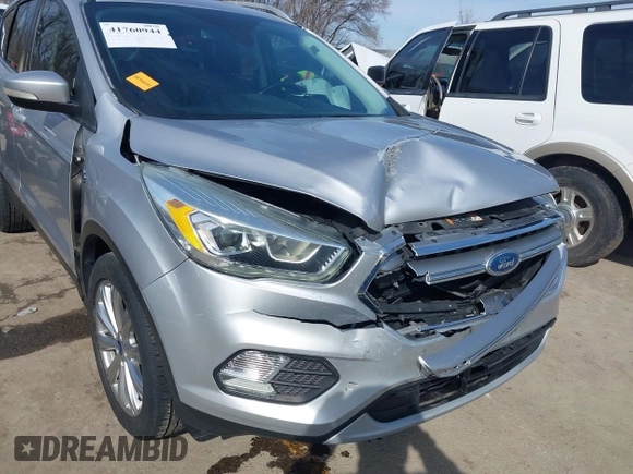 2017 Ford Escape Titanium with VIN 1FMCU0JD3HUB13234, listed as a IAAI auction lot 41760944 with 113,361 mi miles. Bid and sale history available at carsss.com. Image 6.