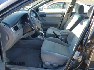 2006 Suzuki Forenza z VIN KL5JD56ZX6K278029, wystawiony jako Copart lot #82026904 z przebiegiem 117 700 mil mil oraz Szkody całkowita. Historia ofert i sprzedaży dostępna na DreamBid. Obrazek 7.