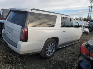 2015 GMC Yukon XL SLT with VIN 1GKS1HKC4FR139634, listed as a Copart auction lot 42974045 with 0 mi miles and Salvage Title. Bid and sale history available at carsss.com. Image 3.