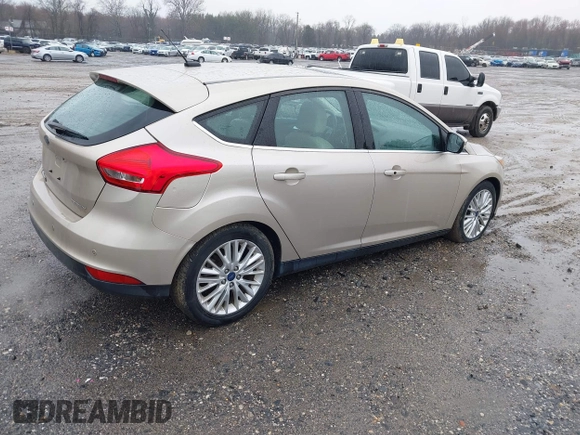 2017 Ford Focus Titanium with VIN 1FADP3N26HL207100, listed as a IAAI auction lot 41865961 with 220,850 mi miles and . Bid and sale history available at carsss.com. Image 4.