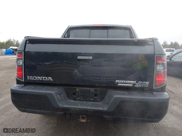 2014 Honda Ridgeline SE with VIN 5FPYK1F66EB005881, listed as a IAAI auction lot 41977349 with 184,567 mi miles. Bid and sale history available at carsss.com. Image 16.