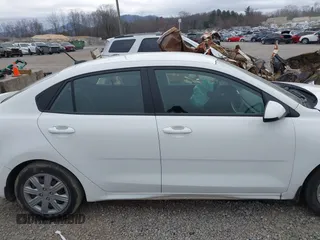 2021 Kia Rio LX with VIN 3KPA24AD3ME400283, listed as a IAAI auction lot 41495331 with 84,920 mi miles. Bid and sale history available at carsss.com. Image 13.